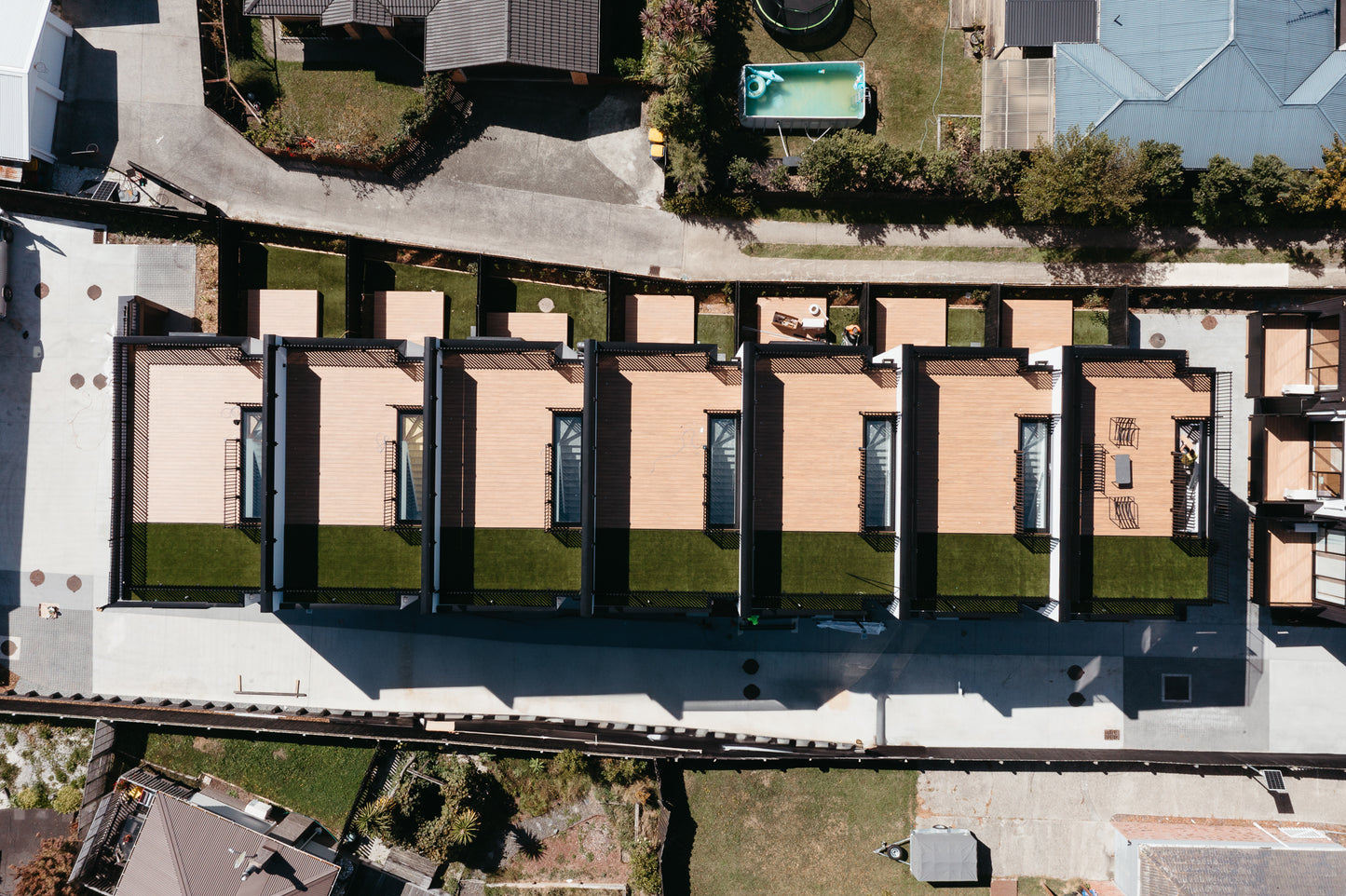 Composite timber decking on Anchorjak adjustable pedestals. suitable for composite, tiger turf, over nuraply or waterproof areas.