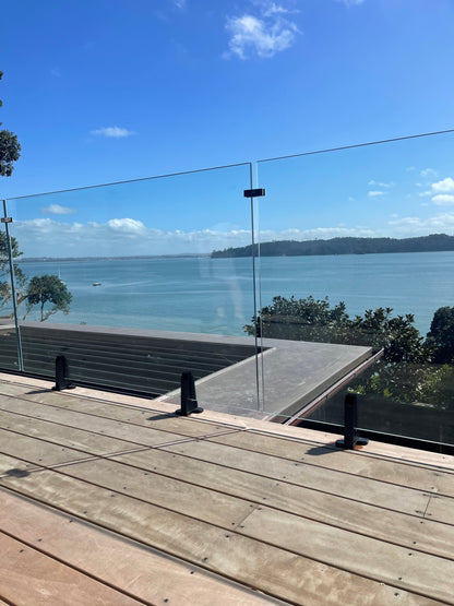 Anchorjak Floating timber deck on Anchorjak Pedestals with Frameless Glass Railing Auckland, Herne bay