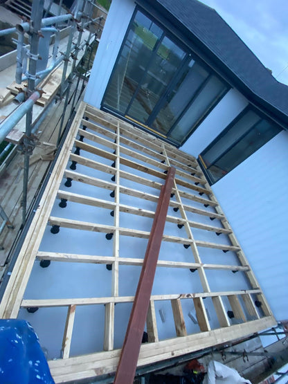 JV88 Pedestal timber framed decking system on Anchorjaks. Engineered to hold railings