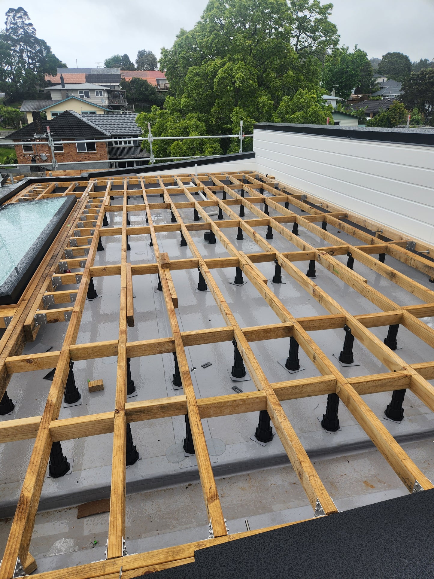 maximized outdoor living with a roof top terrace constructed with JV88 brackets