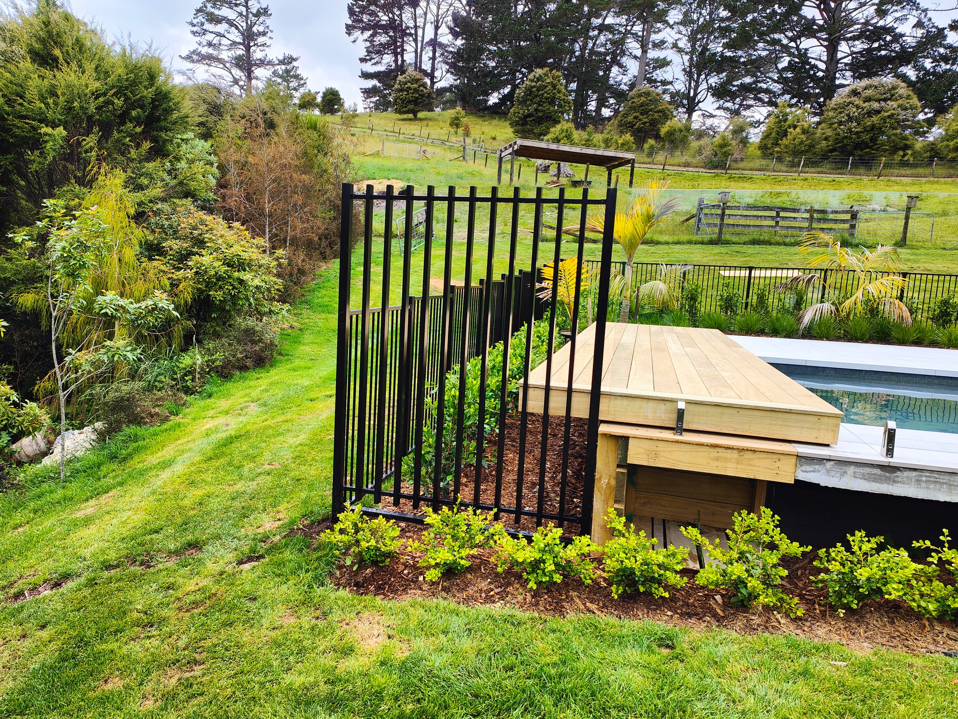 ground screw into clay with fencing attached auckland