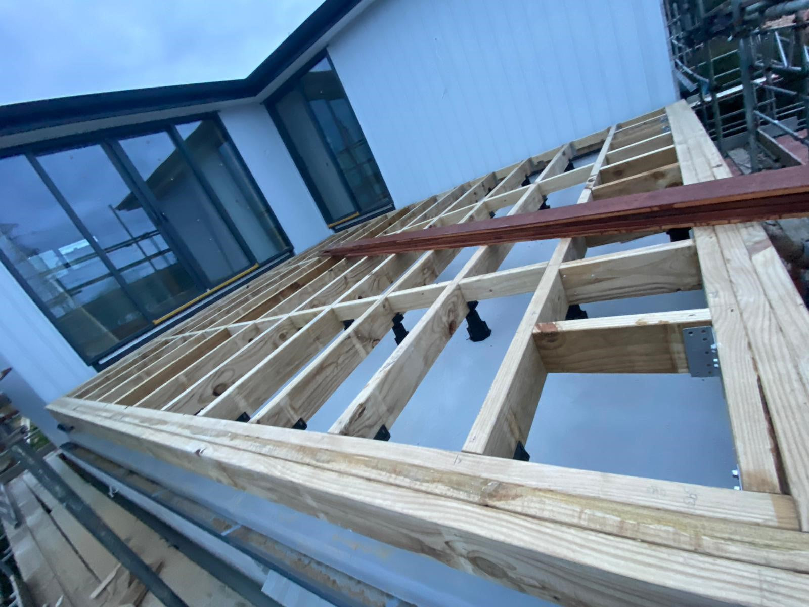 JV88's on 90mm timber framing on Anchorjaks. Auckland City affordable decking pedestals