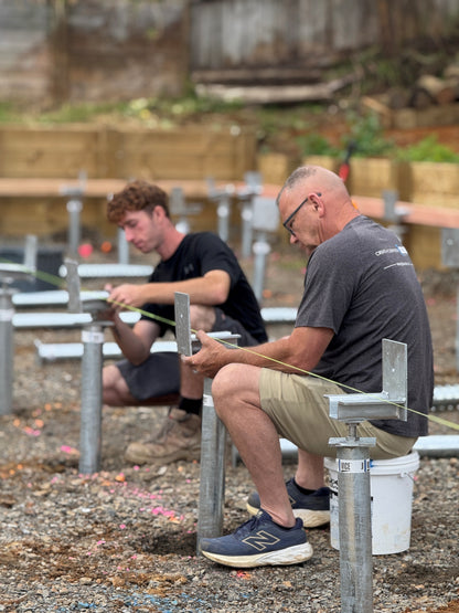 People in Auckland installing Ground screws using the J Vice system for homes